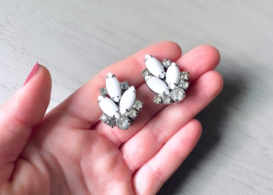 1950s Vintage Milk Glass Earrings, Diamond Rhinestone Clip on Earrings by Piggle and Pop held in Hand for Size Reference