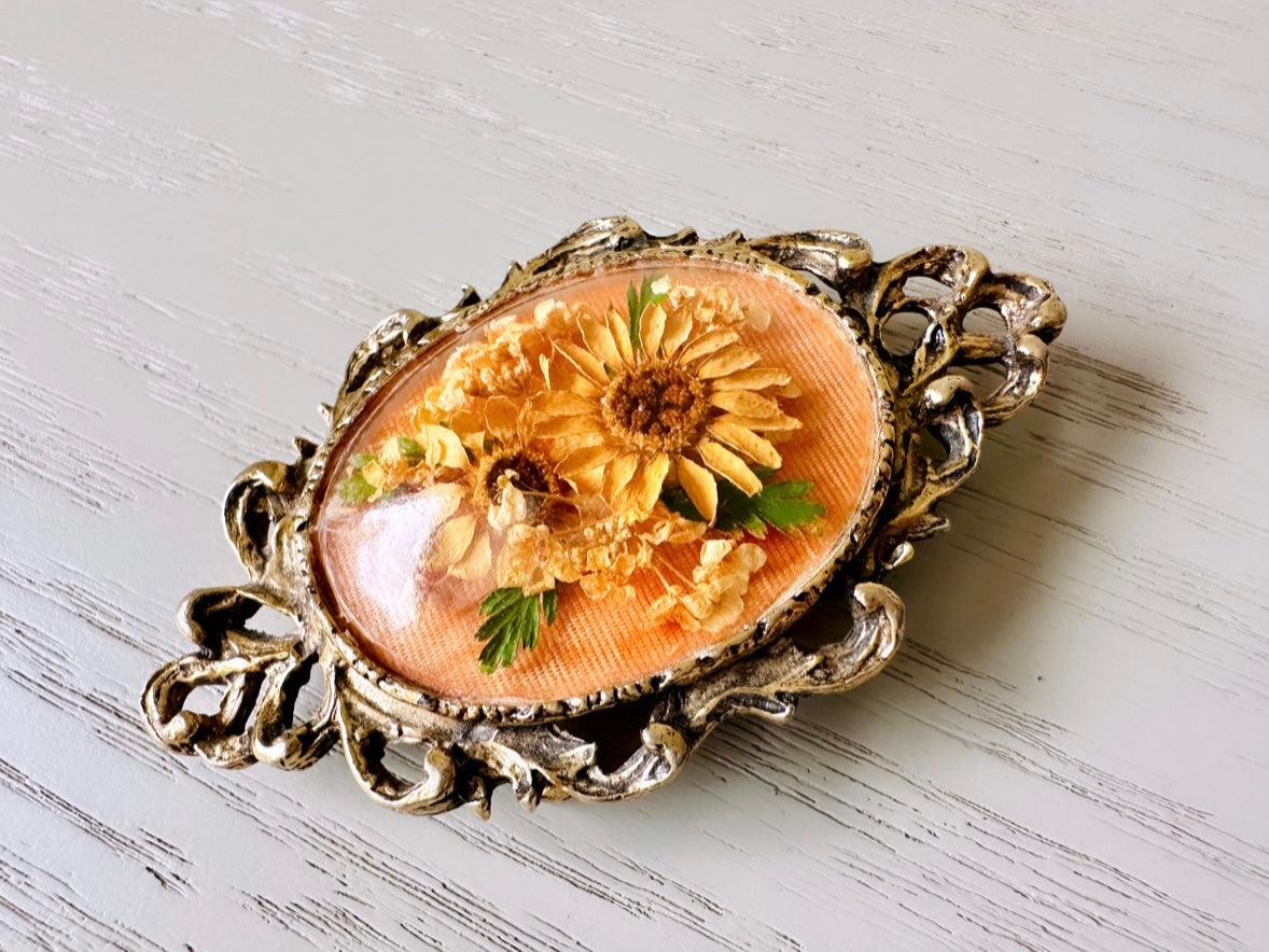 Orange brooch on sale